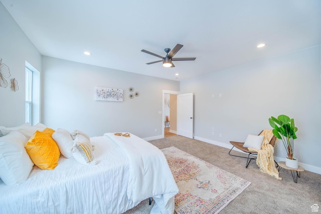 bedroom with light colored carpet and ceiling fan