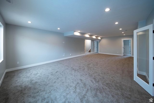 unfurnished room featuring carpet floors
