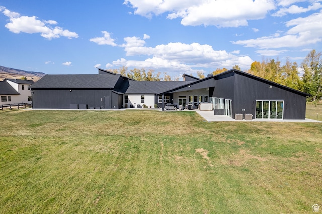 70 W 350 S, Garden City, UT 84028 - rear view of house featuring a patio and a lawn