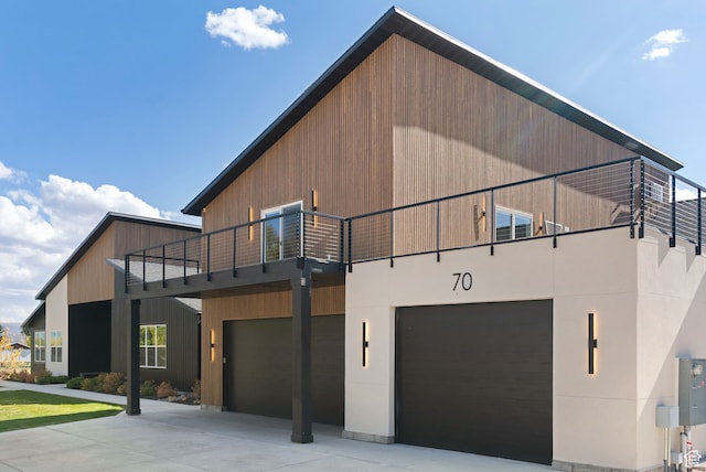 70 W 350 S, Garden City, UT 84028 - view of front facade featuring a balcony and a garage