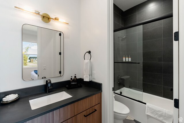 70 W 350 S, Garden City, UT 84028 - full bathroom featuring vanity, enclosed tub / shower combo, and toilet