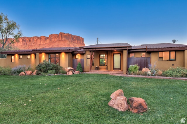 425 Amber Ln, Castle Valley, UT 84532 - view of front of property featuring a front yard and a mountain view
