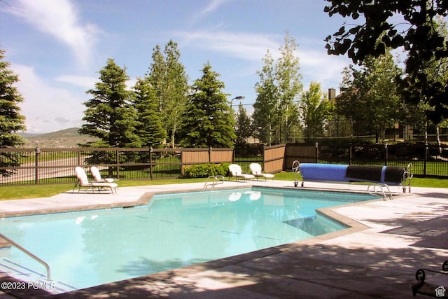 6861 N 2200 W Unit 9U, Park City, UT 84098 - view of pool with a fenced in pool, a patio area, and fence