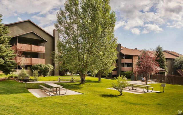 6861 N 2200 W Unit 9U, Park City, UT 84098 - view of community featuring a yard