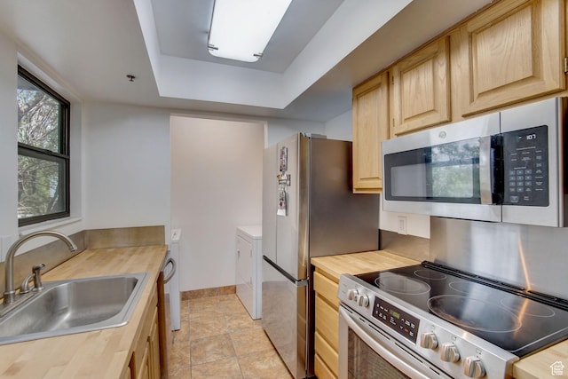 6861 N 2200 W Unit 9U, Park City, UT 84098 - kitchen with stainless steel appliances, light brown cabinetry, a sink, and butcher block countertops