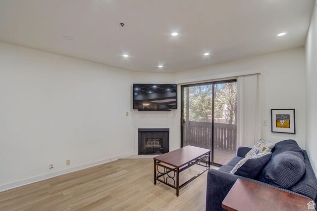 6861 N 2200 W Unit 9U, Park City, UT 84098 - living room featuring recessed lighting, light wood finished floors, and a fireplace