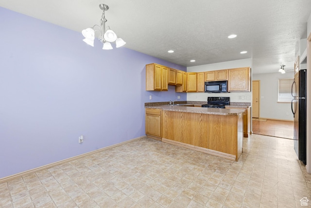 kitchen featuring a notable chandelier, pendant lighting, a peninsula, black appliances, and recessed lighting