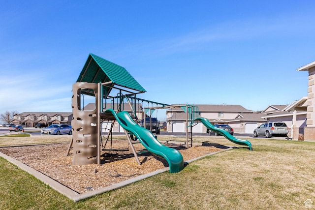 community playground with a residential view and a yard