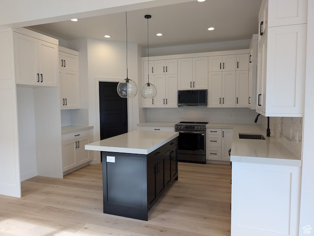 556 N Olympic Way Unit 38, Midway, UT 84049 - kitchen featuring electric stove, a sink, tasteful backsplash, and recessed lighting