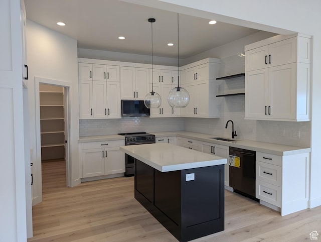 556 N Olympic Way Unit 38, Midway, UT 84049 - kitchen featuring dishwashing machine, electric range, a sink, black microwave, and light wood-style flooring