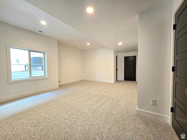 556 N Olympic Way Unit 38, Midway, UT 84049 - spare room featuring light carpet, recessed lighting, and baseboards