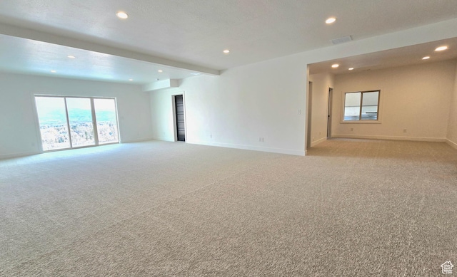 556 N Olympic Way Unit 38, Midway, UT 84049 - spare room featuring recessed lighting, light colored carpet, and baseboards