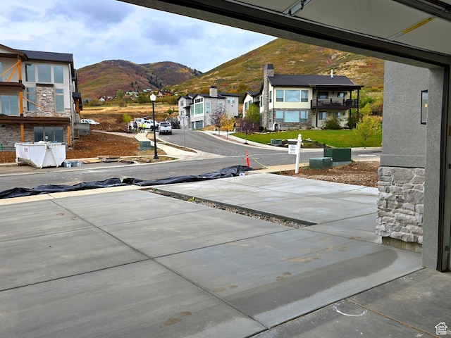 556 N Olympic Way Unit 38, Midway, UT 84049 - view of road with a mountain view, street lighting, and a residential view