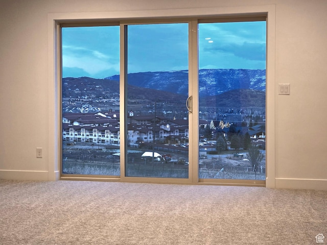 556 N Olympic Way Unit 38, Midway, UT 84049 - spare room with carpet floors, a mountain view, and baseboards