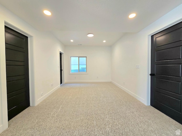 556 N Olympic Way Unit 38, Midway, UT 84049 - empty room with light carpet, baseboards, and recessed lighting