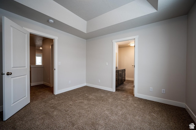 655 S 85 E Unit 32, Smithfield, UT 84335 - unfurnished bedroom with dark carpet and baseboards