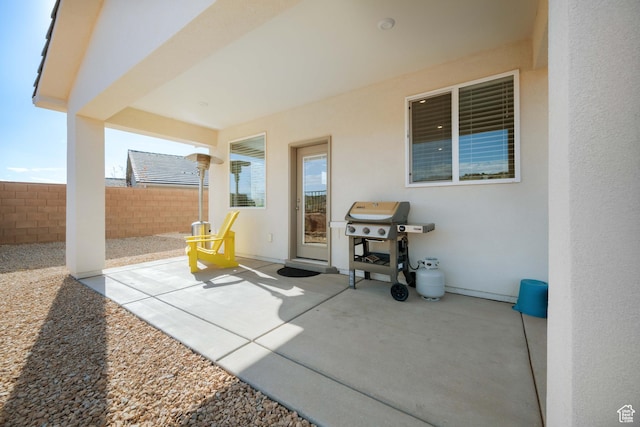 974 N Pleasant Valley Ln, Washington, UT 84780 - view of patio featuring fence and area for grilling