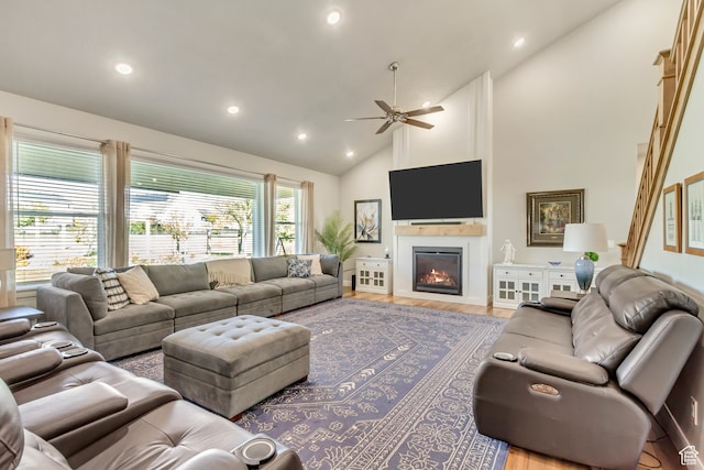 1441 E Snowflake Ave N, Eagle Mountain, UT 84005 - living room featuring ceiling fan, high vaulted ceiling, and light hardwood / wood-style flooring