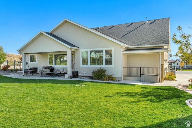 1441 E Snowflake Ave N, Eagle Mountain, UT 84005 - back of property featuring an outdoor living space, a yard, and a patio