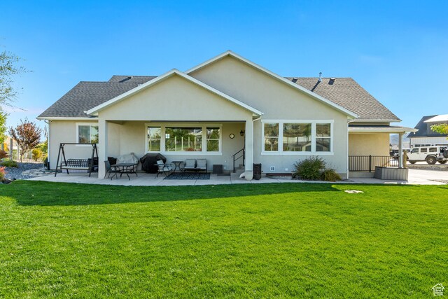 1441 E Snowflake Ave N, Eagle Mountain, UT 84005 - back of house featuring a patio and a yard