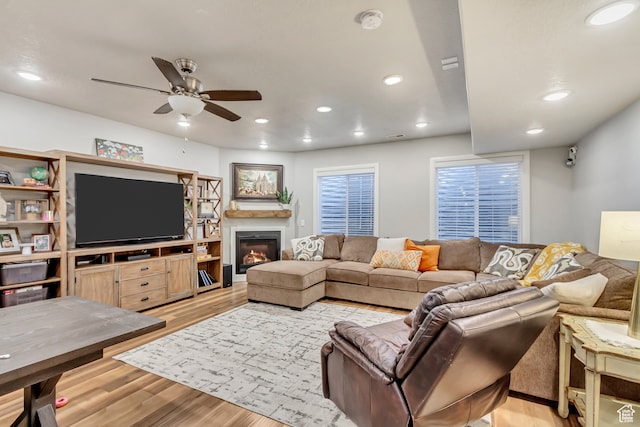 1441 E Snowflake Ave N, Eagle Mountain, UT 84005 - living room featuring light wood-type flooring and ceiling fan