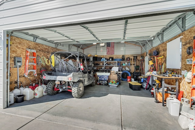 1441 E Snowflake Ave N, Eagle Mountain, UT 84005 - garage featuring a workshop area