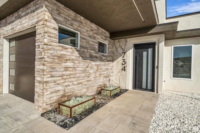 734 S 1220 W, Hurricane, UT 84737 - entrance to property featuring stone siding and stucco siding