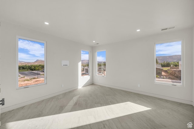 734 S 1220 W, Hurricane, UT 84737 - spare room featuring recessed lighting, baseboards, visible vents, and a mountain view