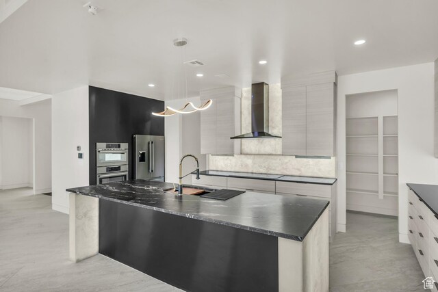 734 S 1220 W, Hurricane, UT 84737 - kitchen with dark countertops, appliances with stainless steel finishes, modern cabinets, and wall chimney exhaust hood