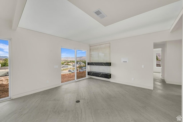 734 S 1220 W, Hurricane, UT 84737 - unfurnished living room featuring baseboards and visible vents
