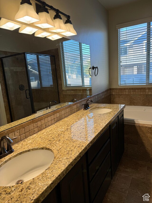 1260 N 200 W, Bountiful, UT 84010 - bathroom featuring double vanity, a sink, a stall shower, and a wealth of natural light
