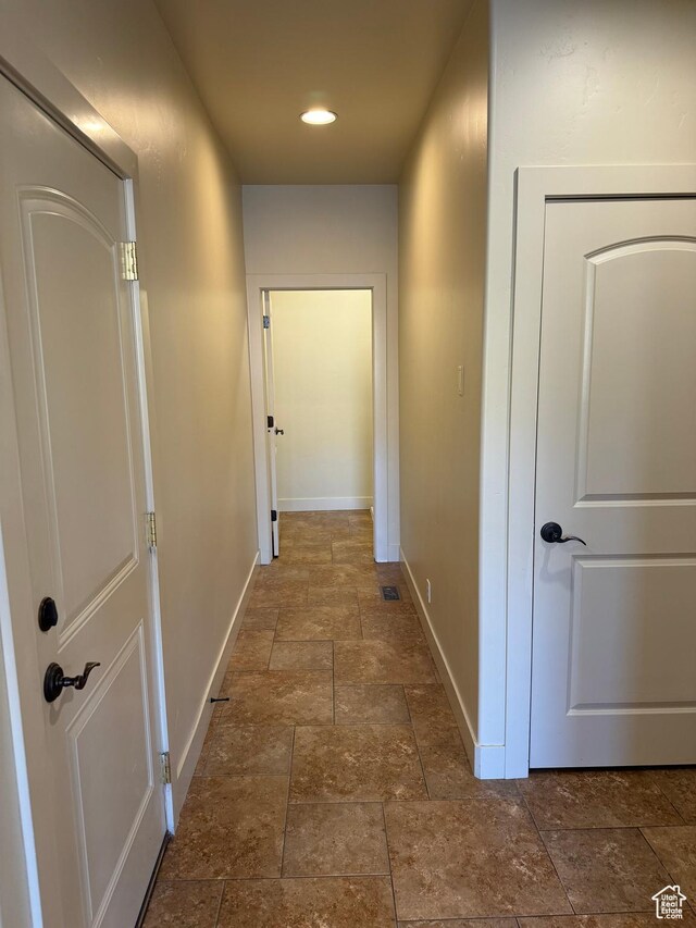 1260 N 200 W, Bountiful, UT 84010 - hallway featuring baseboards and stone tile floors