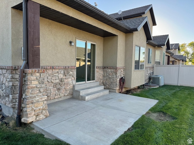 1260 N 200 W, Bountiful, UT 84010 - back of house featuring fence, stone siding, a patio, stucco siding, and entry steps