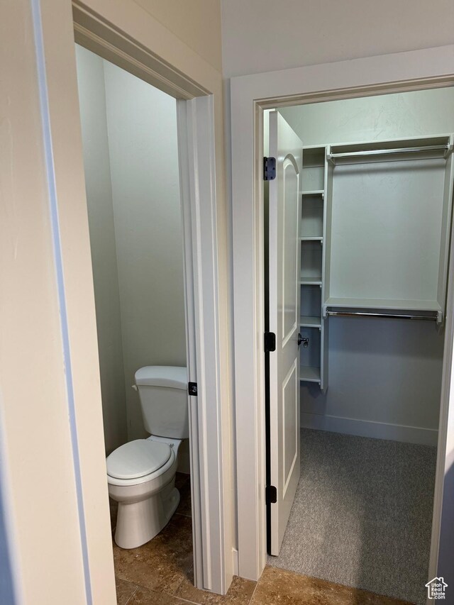 1260 N 200 W, Bountiful, UT 84010 - bathroom featuring a walk in closet and toilet