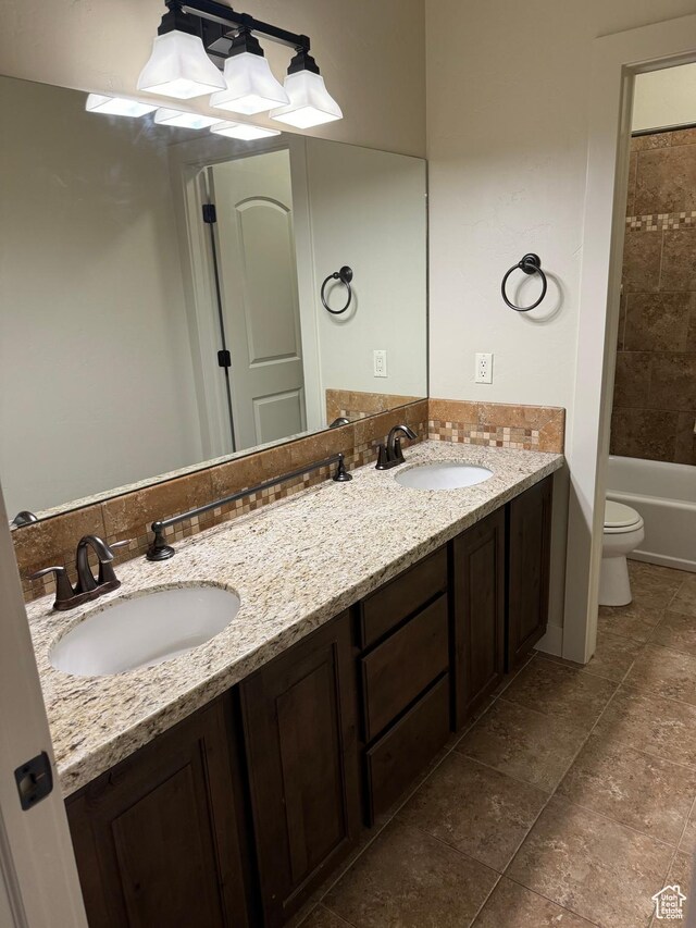 1260 N 200 W, Bountiful, UT 84010 - bathroom featuring a sink, toilet, and double vanity