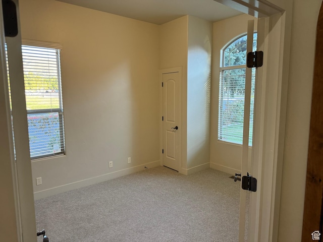1260 N 200 W, Bountiful, UT 84010 - carpeted spare room with a healthy amount of sunlight and baseboards