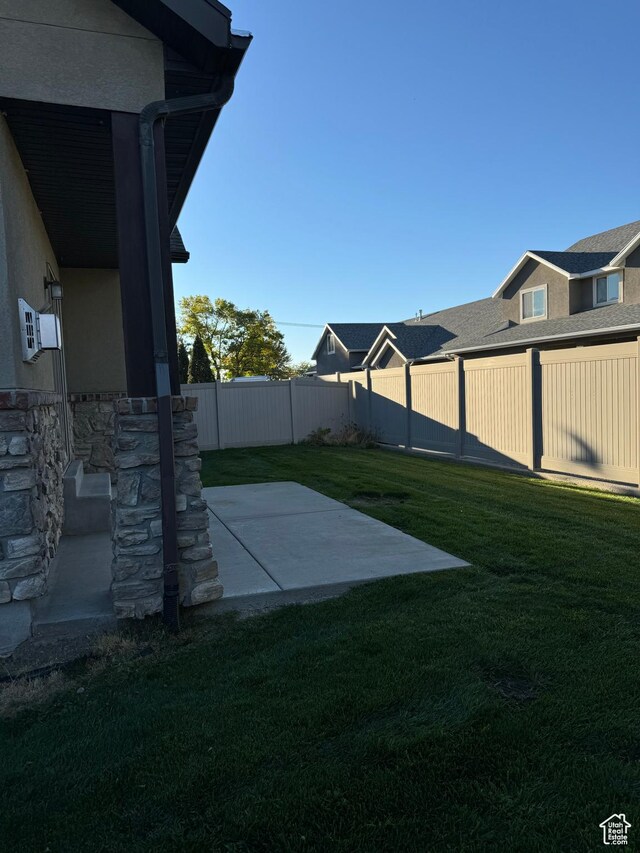 1260 N 200 W, Bountiful, UT 84010 - view of yard featuring a fenced backyard and a patio area