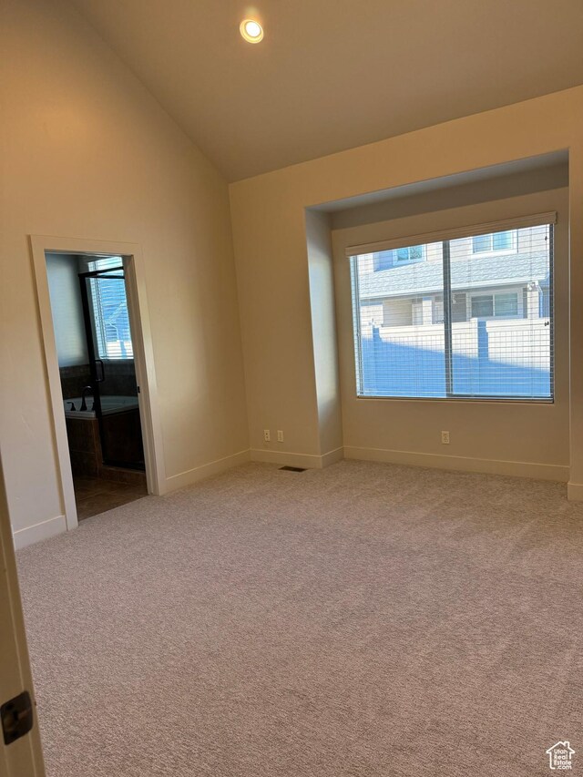 1260 N 200 W, Bountiful, UT 84010 - spare room with baseboards, light carpet, recessed lighting, and lofted ceiling