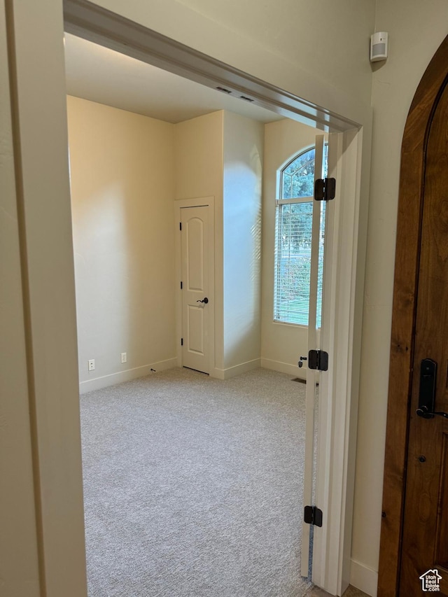 1260 N 200 W, Bountiful, UT 84010 - carpeted spare room featuring baseboards and arched walkways
