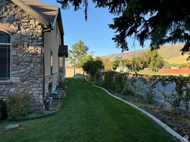 1260 N 200 W, Bountiful, UT 84010 - view of yard with fence and a mountain view