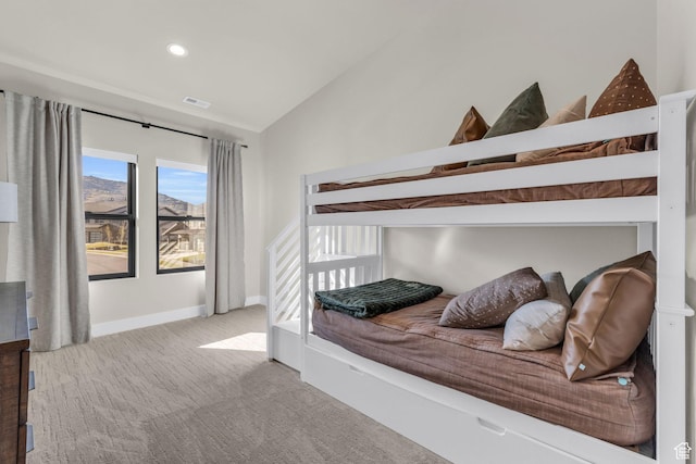 carpeted bedroom featuring baseboards, visible vents, lofted ceiling, and recessed lighting