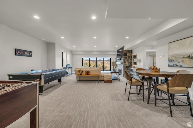 rec room featuring recessed lighting, a stone fireplace, carpet, and pool table