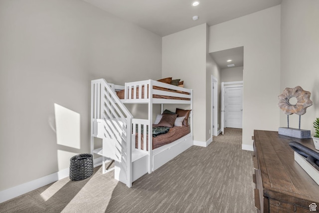 bedroom with carpet, recessed lighting, and baseboards
