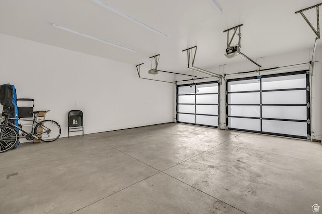 garage featuring a garage door opener