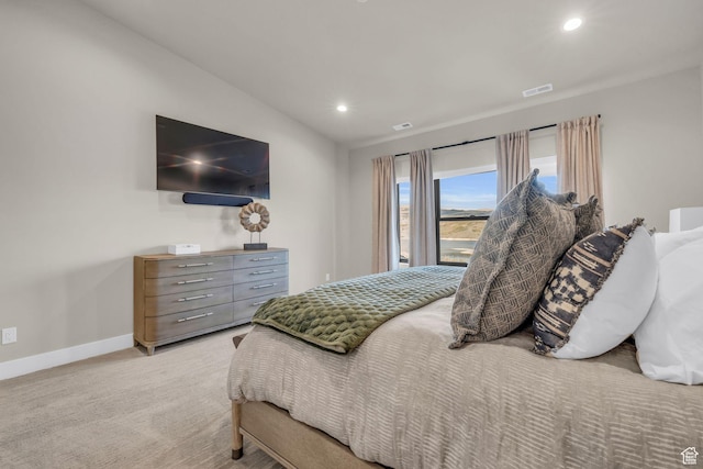 bedroom featuring lofted ceiling, carpet flooring, visible vents, baseboards, and recessed lighting