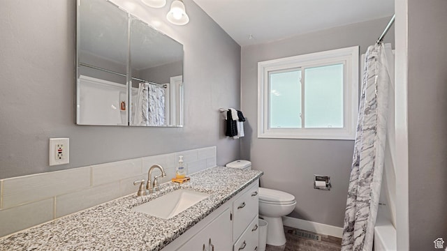 535 N 300 E, Brigham City, UT 84302 - bathroom featuring vanity, baseboards, wood finished floors, and toilet