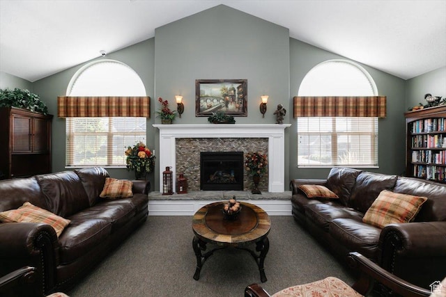 242 E 2230 N Unit A, North Logan, UT 84341 - carpeted living area featuring vaulted ceiling and a premium fireplace