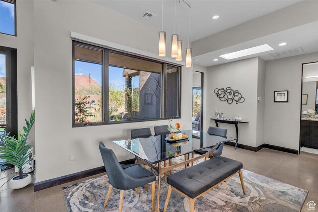 644 W Wild Indigo Way, Ivins, UT 84738 - dining area with a skylight, visible vents, and a wealth of natural light