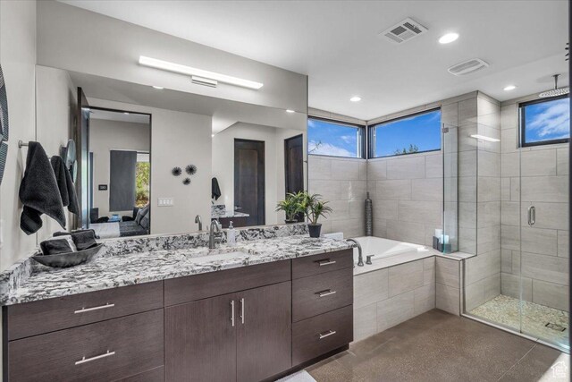 644 W Wild Indigo Way, Ivins, UT 84738 - ensuite bathroom with a shower stall, visible vents, ensuite bathroom, recessed lighting, and vanity
