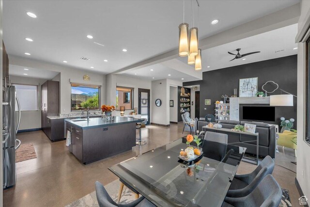 644 W Wild Indigo Way, Ivins, UT 84738 - dining space featuring concrete floors, recessed lighting, visible vents, and baseboards